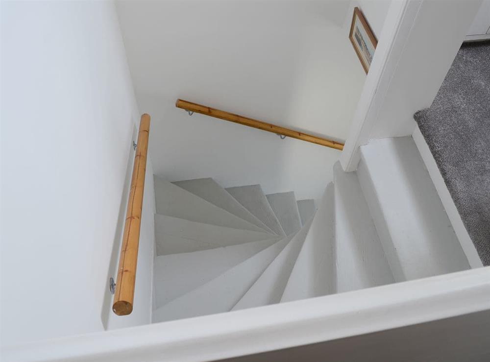 Turning staircase to the first floor at Sea Thistle Cottage in Nairn, Highlands, Morayshire