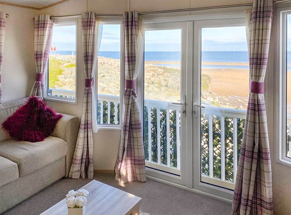 Living area at Sea View Caravan in Rhyl, Clwyd