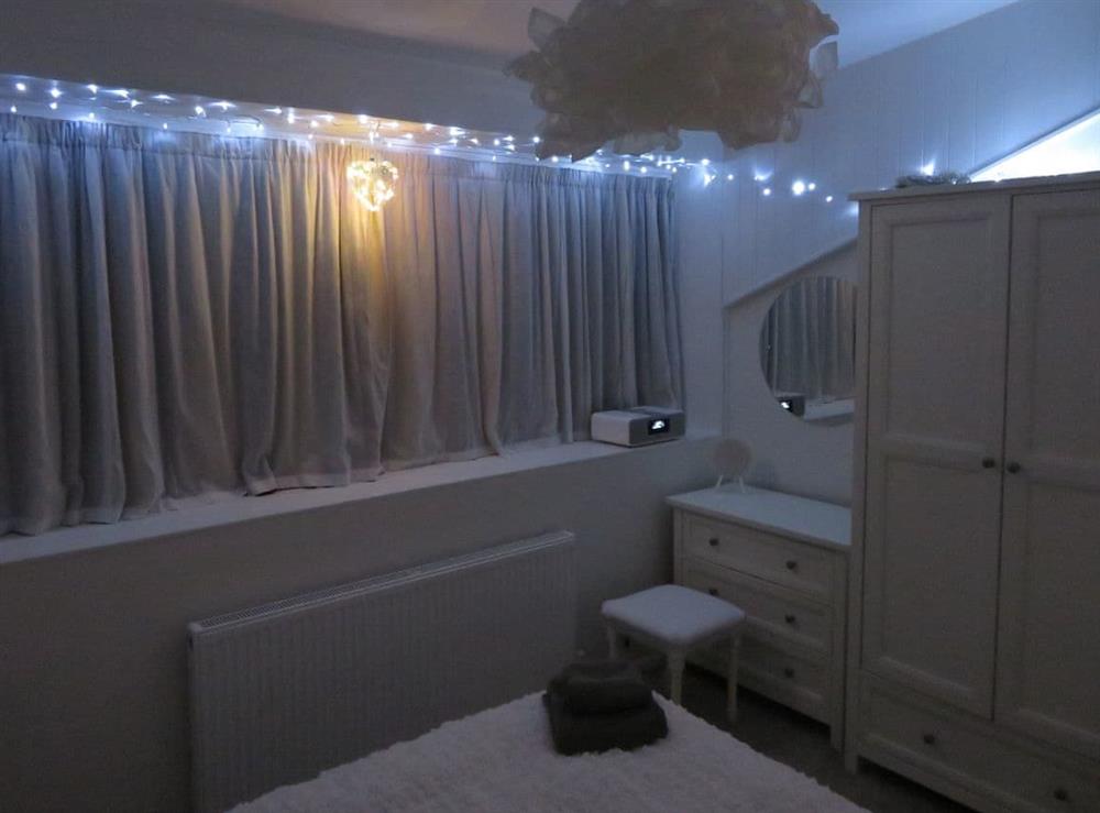 Cosy evenings in the double bedroom (photo 2) at Sea View in Deganwy, Gwynedd