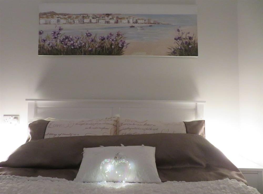 Cosy evenings in the double bedroom at Sea View in Deganwy, Gwynedd