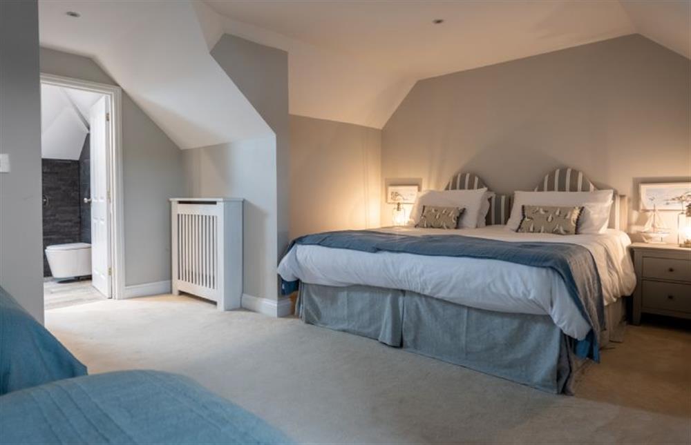 Bedroom eight with super-king size bed and 3’ single beds at Sea View Manor, Mundesley near Norwich