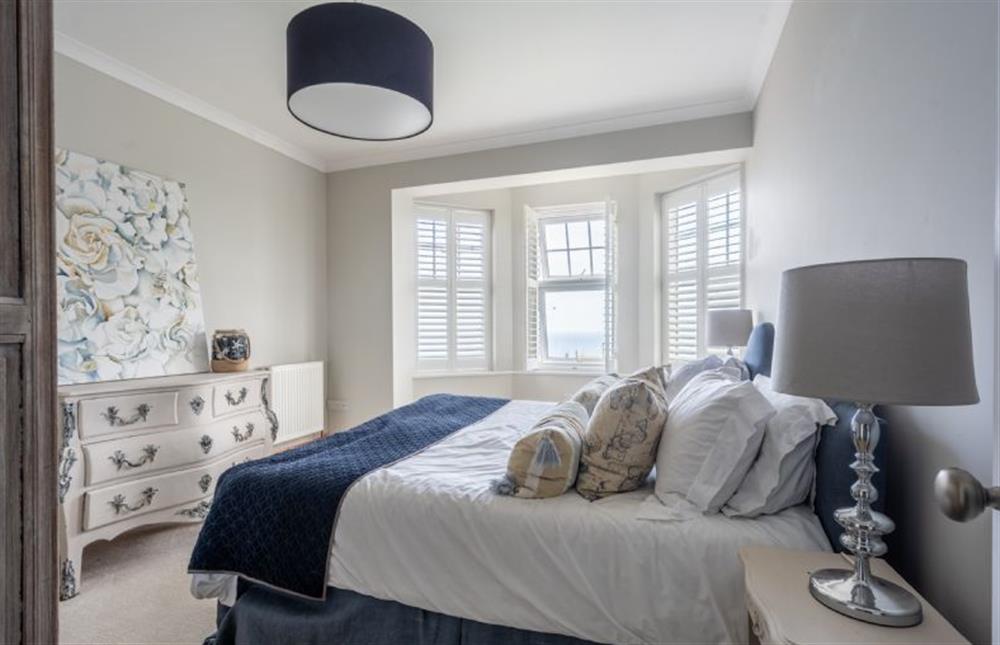Bedroom four with 6’ super-king size bed that can be made as a twin upon prior request (photo 2) at Sea View Manor, Mundesley near Norwich