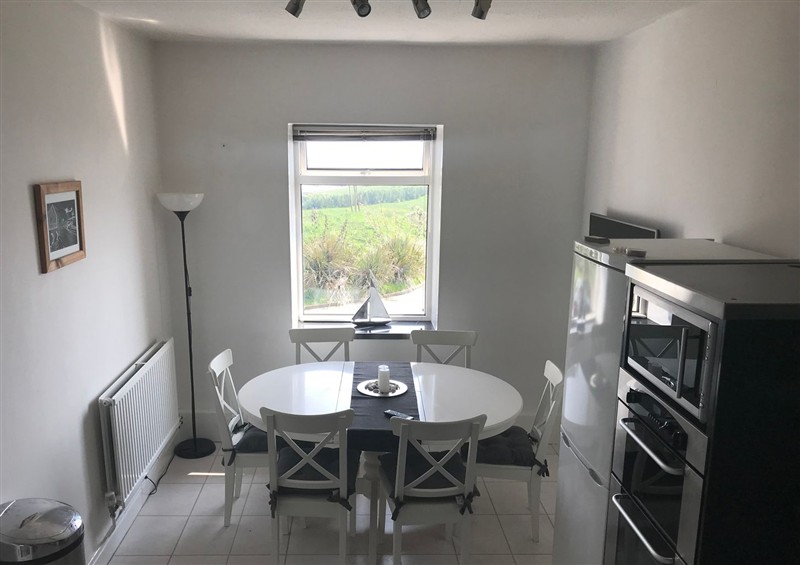 This is the dining room at Sea Views No 8 Plas Darien, Trearddur Bay