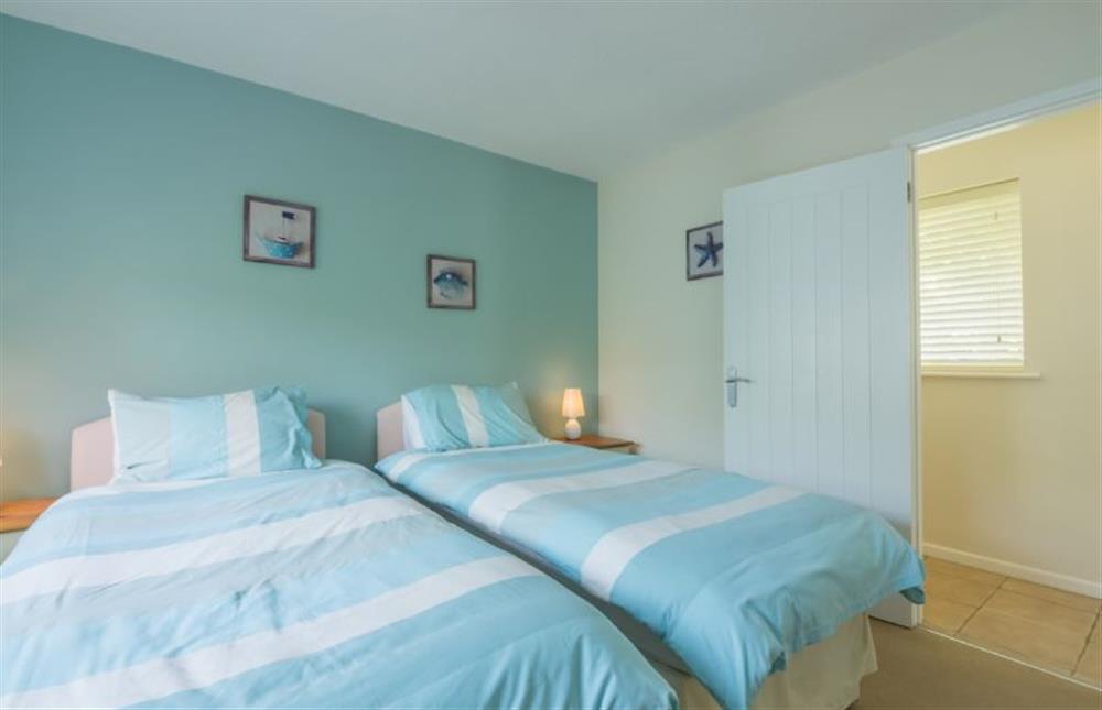 Ground floor: Bedroom two, twin room with full size single beds (photo 2) at Sea Wind, Brancaster near Kings Lynn