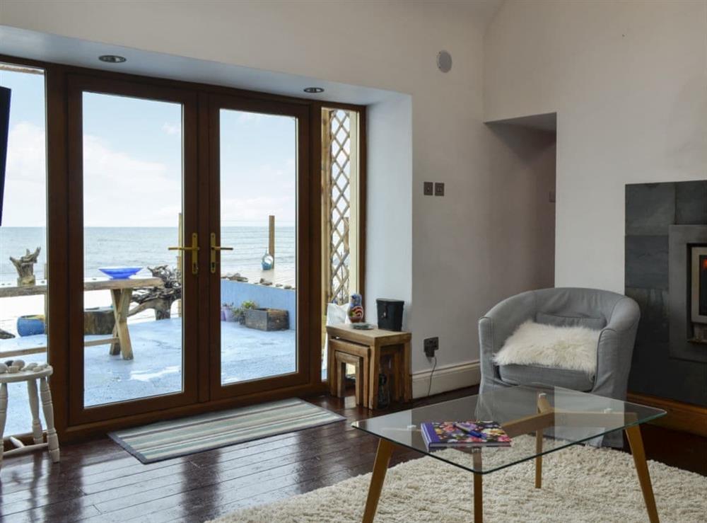 Cosy living room with fantastic sea views at Sea Yonder in Buckie, near Cullen, Highlands, Banffshire