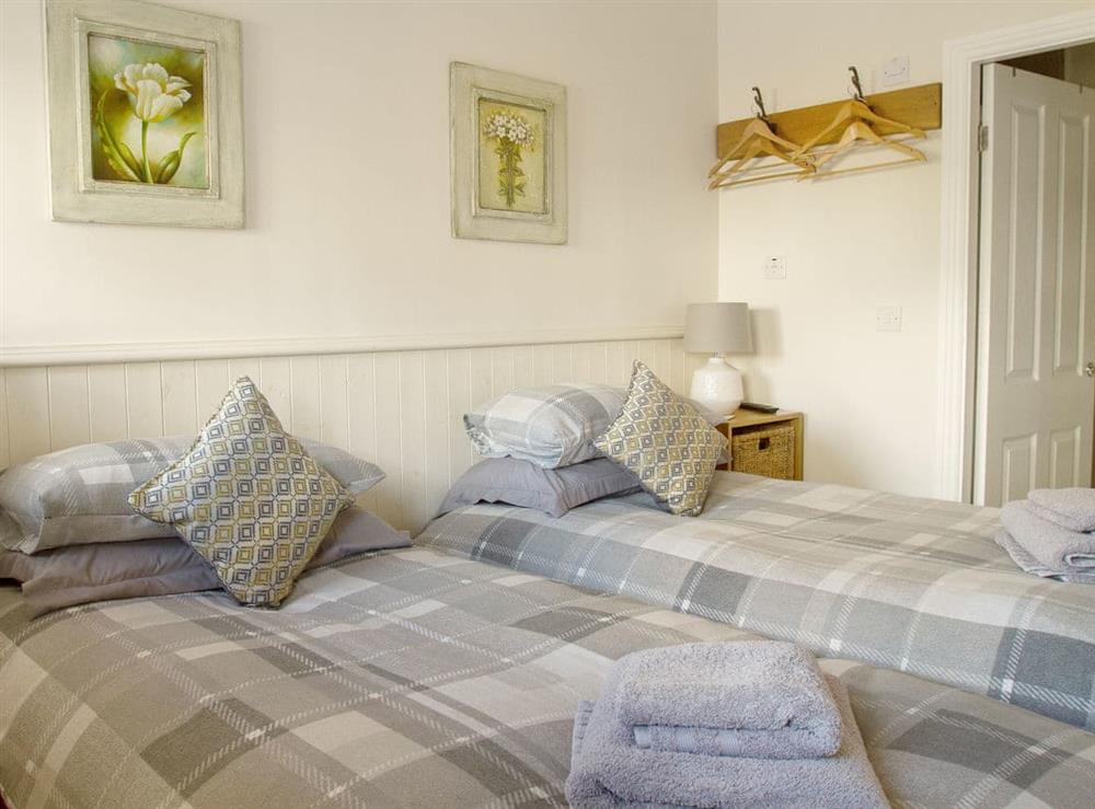 Relaxing bedroom with en-suite shower room (photo 2) at Gannet Lodge, 