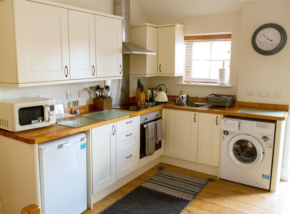 Well-equipped kitchen area at Gannet Lodge, 