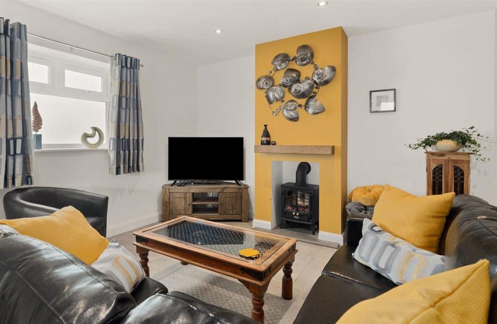 Enjoy the living room at Seaborne Cottage in Pwlheli, Gwynedd