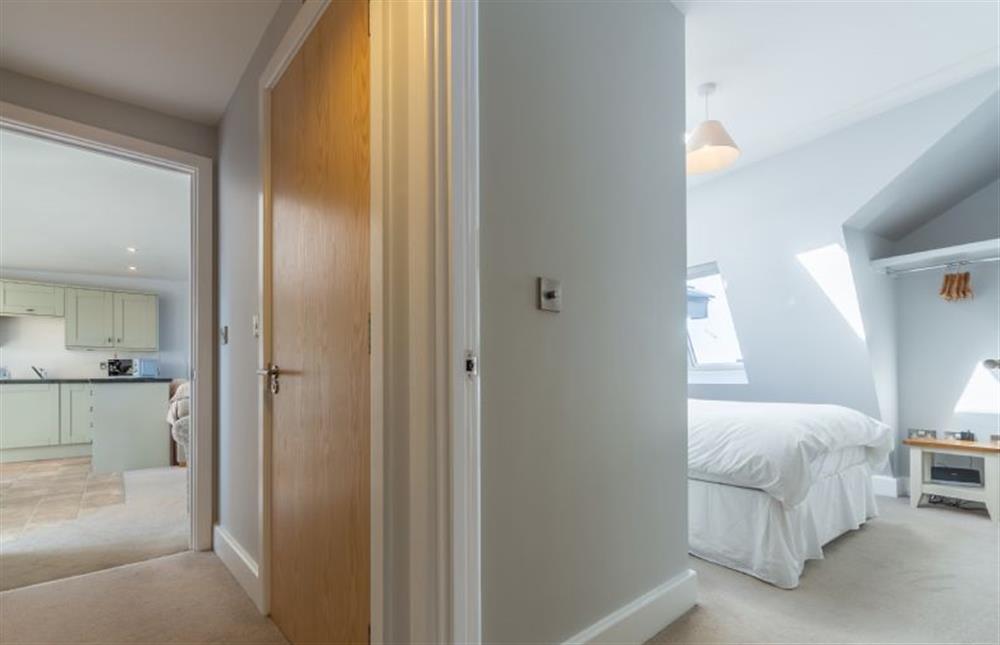Door leading to double bedroom with hanging rail at Seaborne, Wells-next-the-Sea