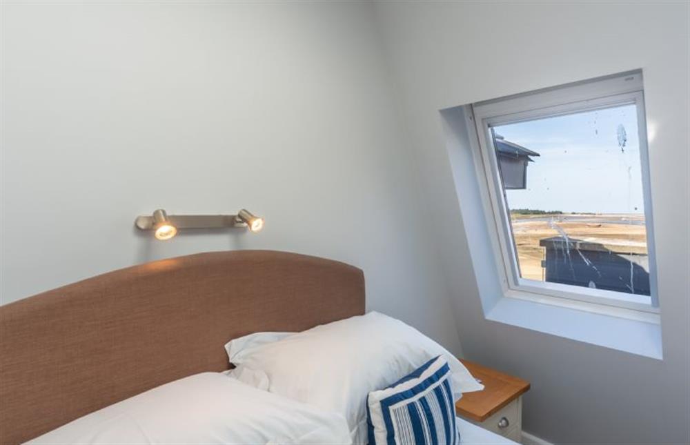 Double bedroom with window with views over the saltmarshes at Seaborne, Wells-next-the-Sea