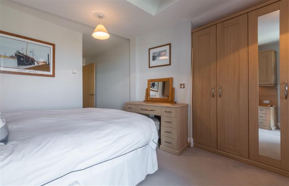 King size bedroom with built in wardrobe at Seaborne, Wells-next-the-Sea