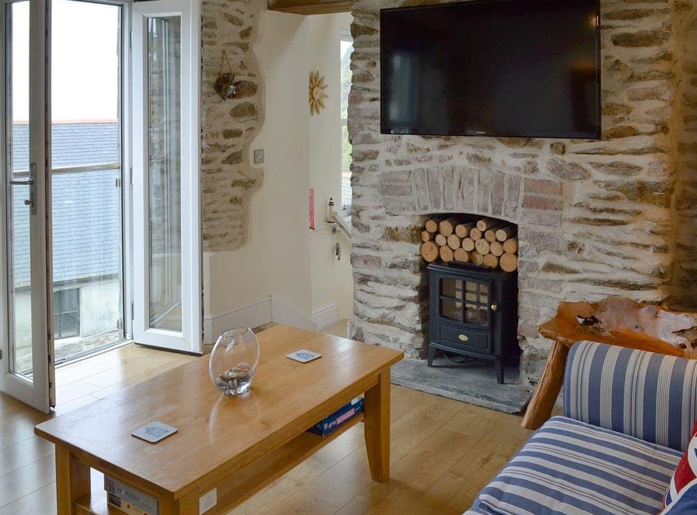 Charming living/ dining room at Seacharm in Gorran Haven, Cornwall