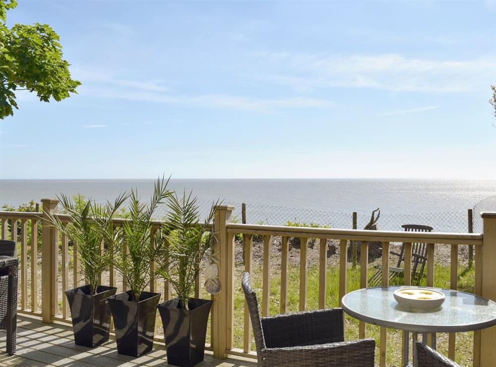 Decked seating area overlooking the sea at Seacliff in Corton, near Lowestoft, Suffolk