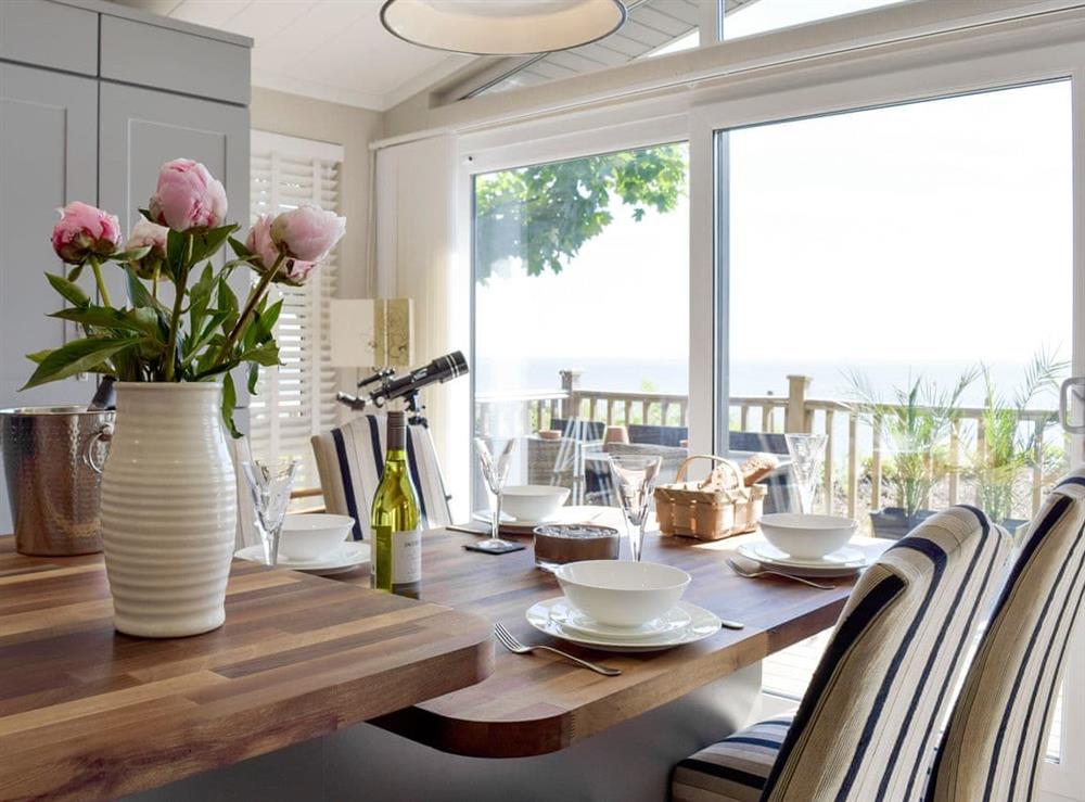 Inviting dining area of convenient open-plan living space at Seacliff in Corton, near Lowestoft, Suffolk