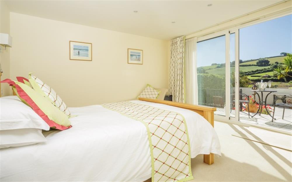 Bedroom 1 with estuary views at Seaflowers in Frogmore