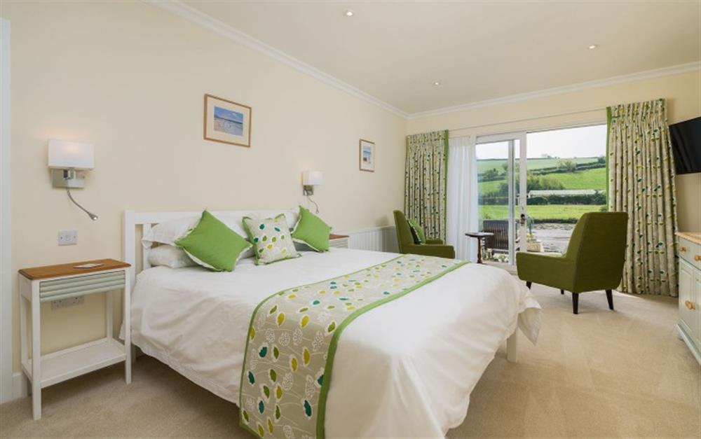 Bedroom 4 -spacious with french doors to the terrace at Seaflowers in Frogmore