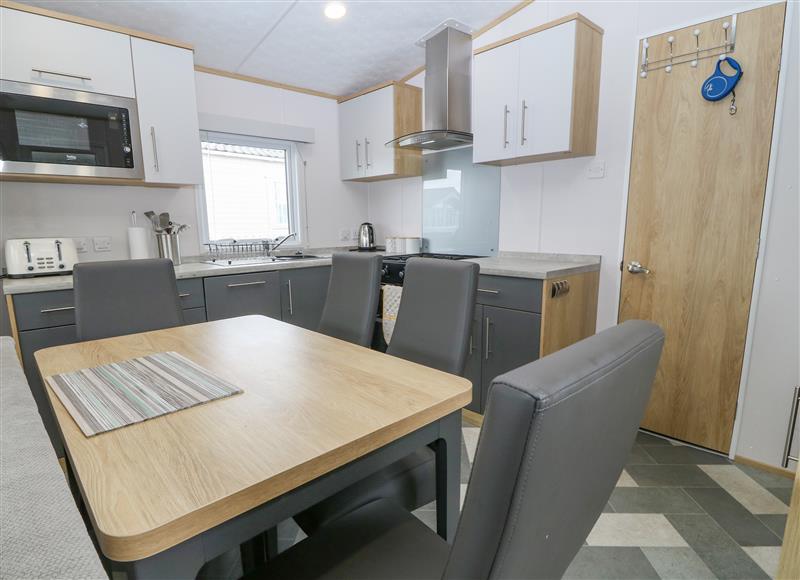 The kitchen at Seafront Holiday Home 1, Pwllheli