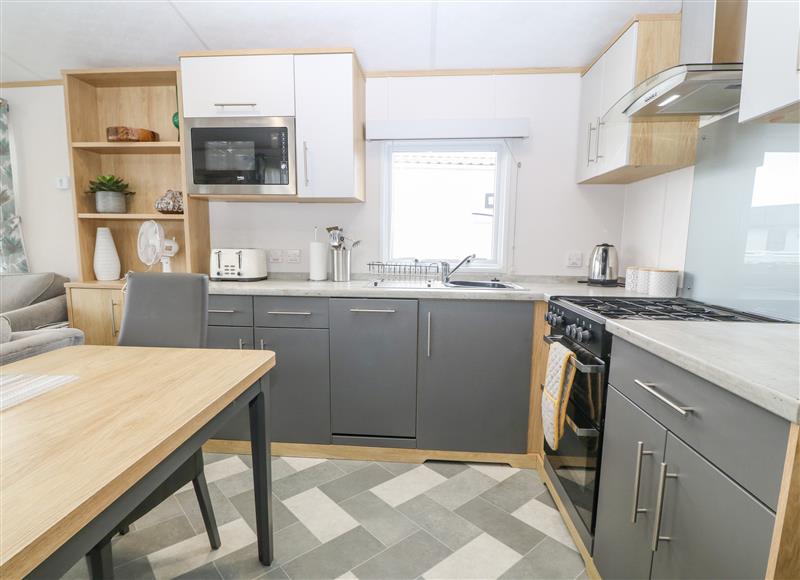 This is the kitchen at Seafront Holiday Home 1, Pwllheli