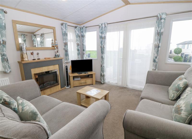 This is the living room at Seafront Holiday Home 1, Pwllheli