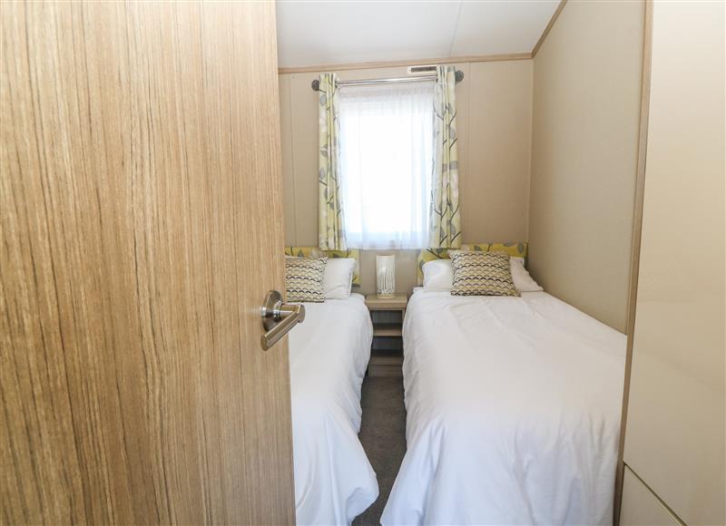 This is a bedroom at Seafront Holiday Home 2, Pwllheli