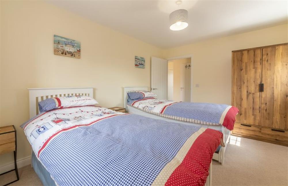 Ground floor:  Bedroom two with wardrobe with drawers at Seagrace, Heacham near Kings Lynn