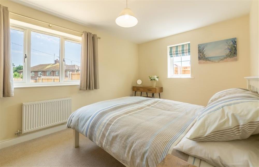 Ground floor:  Master bedroom with double bed at Seagrace, Heacham near Kings Lynn