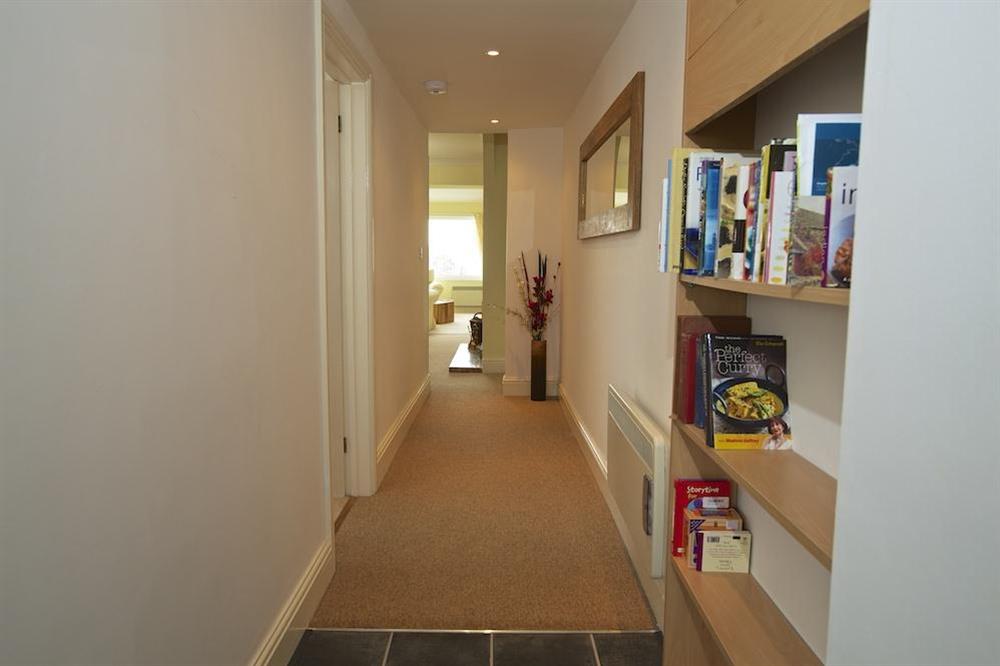 A level entrance leads into a small hallway and direct access to the kitchen at Seagrass in , Hope Cove