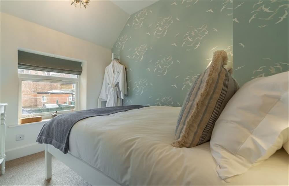 First floor:  Small double bedroom at Seagull Cottage, Hunstanton