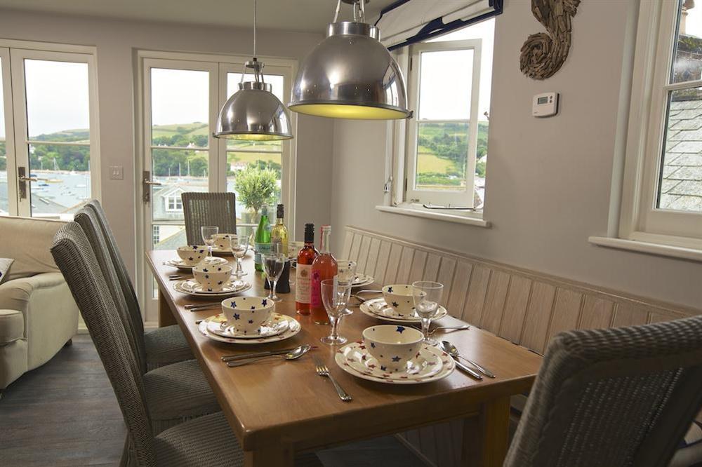 Dining area opens up onto the decking at Seagull Cottage in , Salcombe