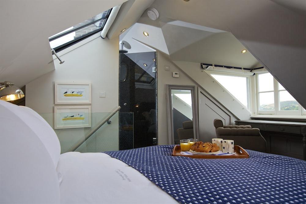 King size en suite bedroom on the second floor (attic level) at Seagull Cottage in , Salcombe