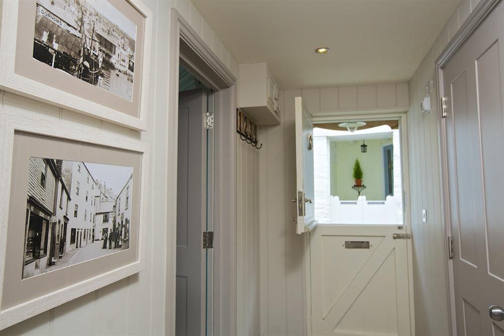 Stable door opens onto Buckley Street at Seagull Cottage in , Salcombe