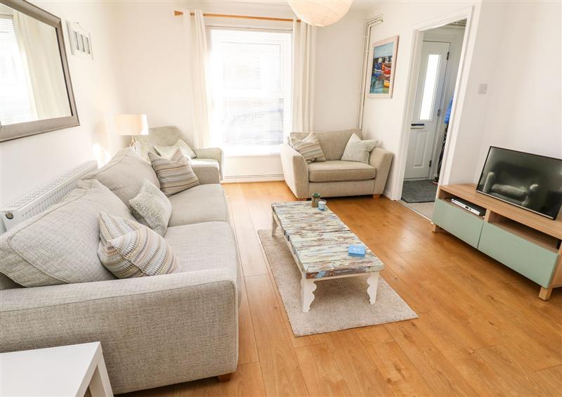 Relax in the living area at Seagulls Retreat, Falmouth