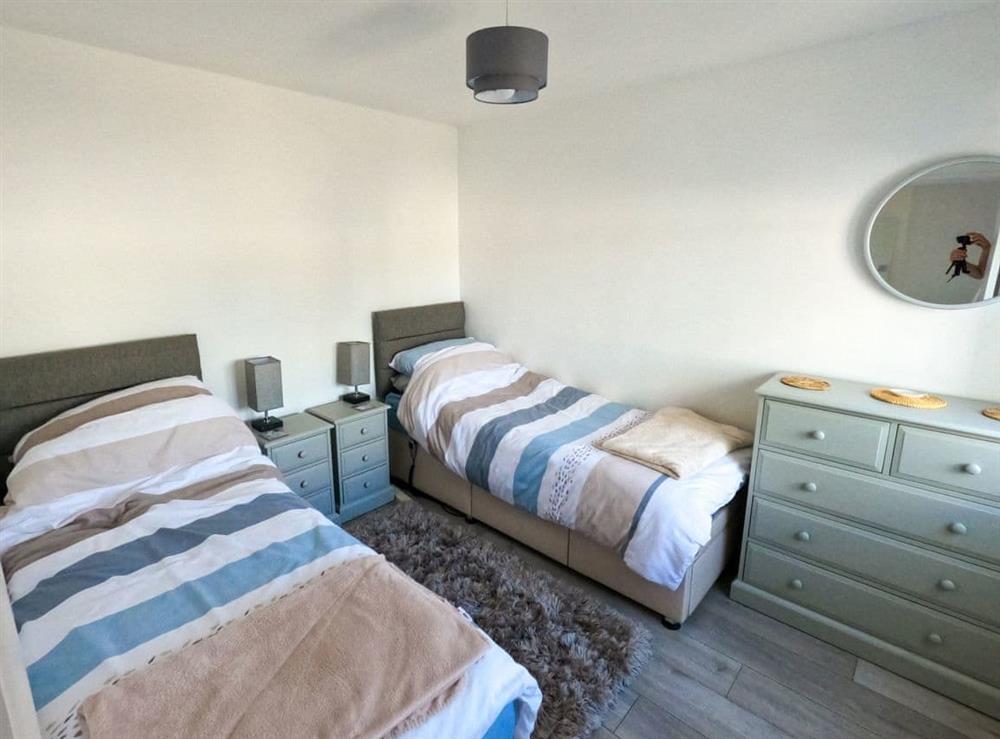 Twin bedroom at Seagulls View in Brixham, Devon