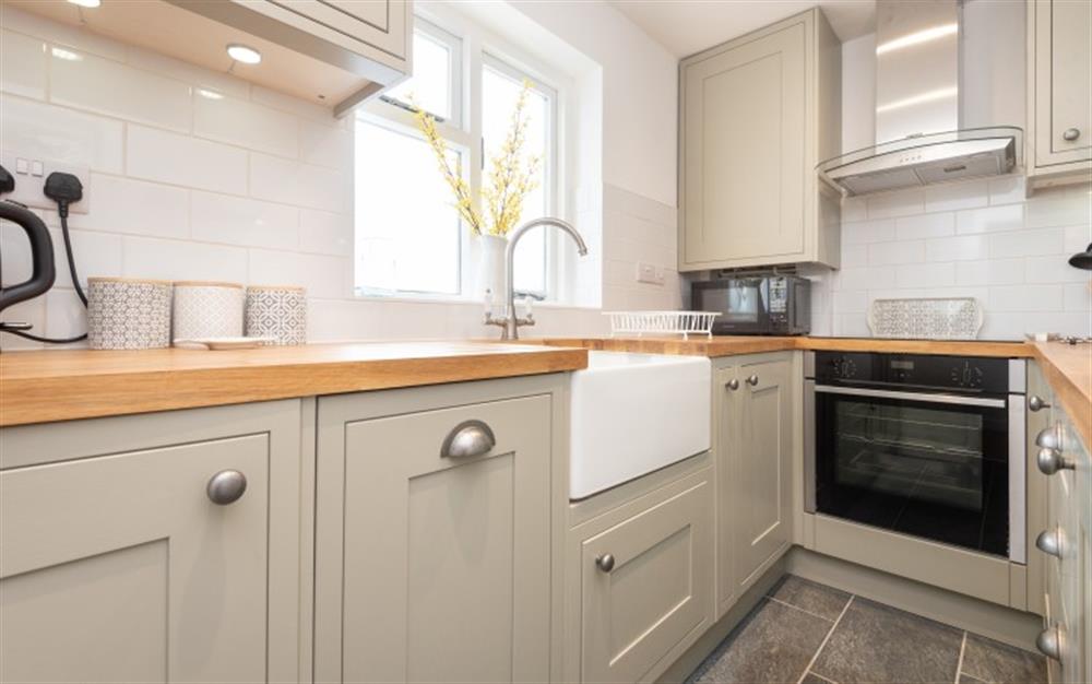 Fully fitted kitchen at Seahorse Cottage in Lyme Regis