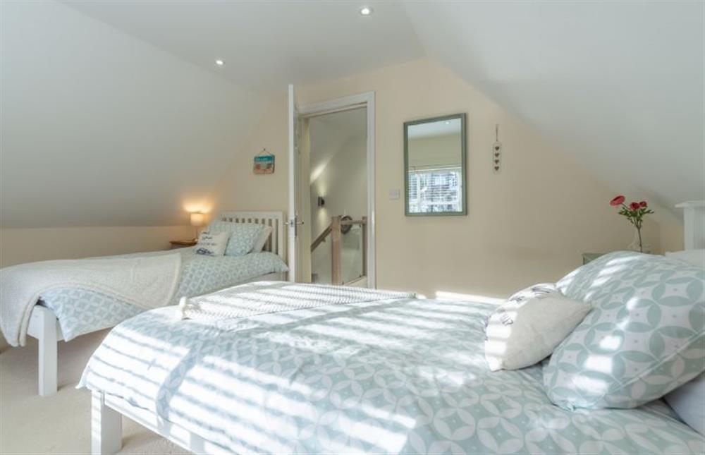 First floor: Bedroom two with twin beds at Seahorse Stables, Overstrand near Cromer