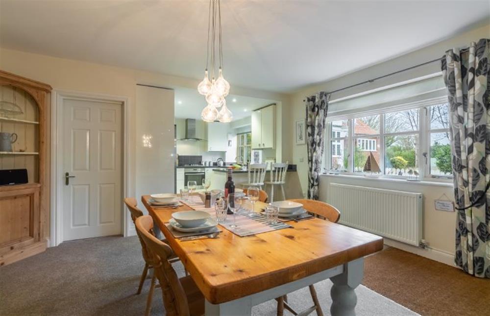 Ground floor: Dining area with a view of the kitchen and utility at Seahorse Stables, Overstrand near Cromer