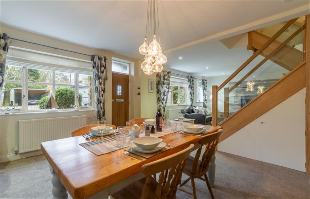 Ground floor: Dining area with staircase to the first floor at Seahorse Stables, Overstrand near Cromer