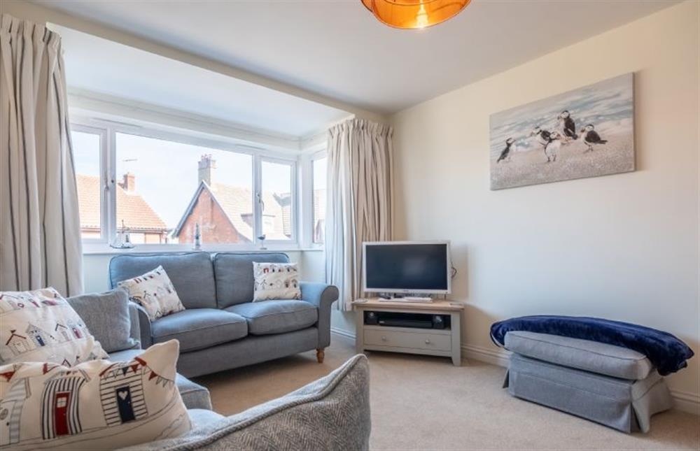 A superbly situated, first floor apartment by the seafront in charming Sheringham at Seas the Day, Sheringham