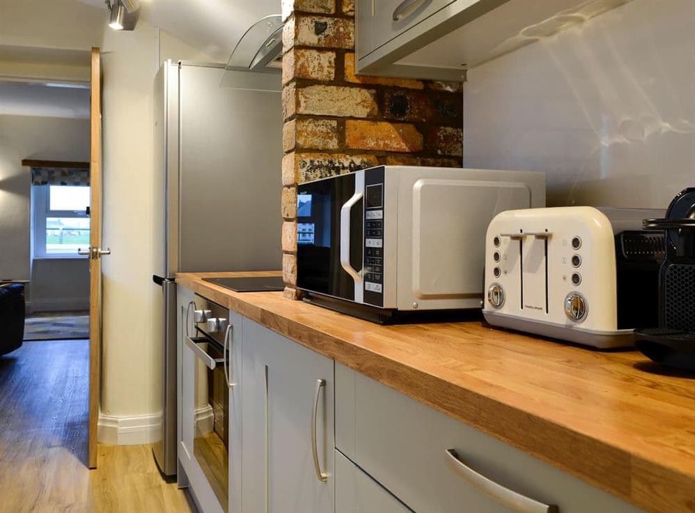 Charming kitchen at Seascape Cottage in Allonby, near Maryport, Cumbria