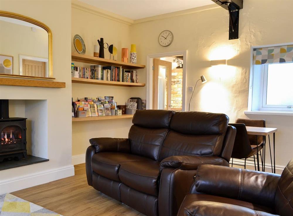 Lovely living room with dining area at Seascape Cottage in Allonby, near Maryport, Cumbria