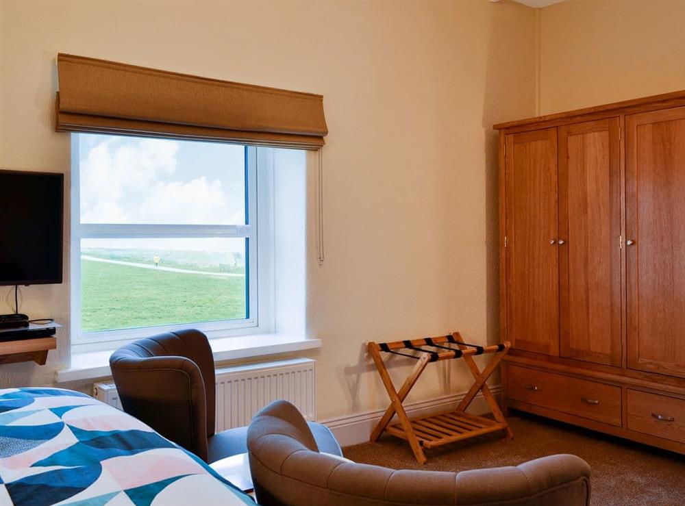Warm and welcoming double bedroom (photo 2) at Seascape Cottage in Allonby, near Maryport, Cumbria