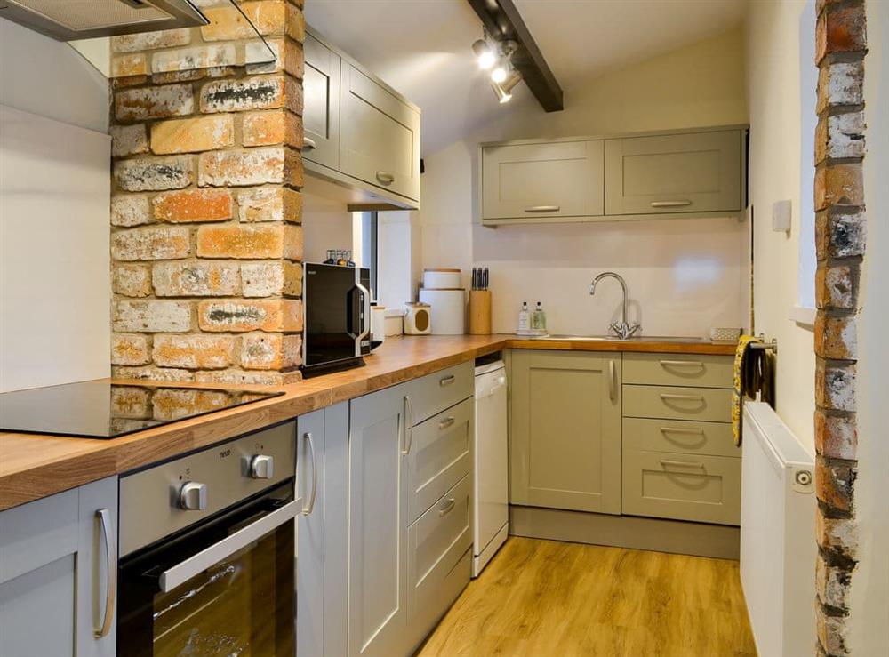 Well appointed galley style kitchen at Seascape Cottage in Allonby, near Maryport, Cumbria