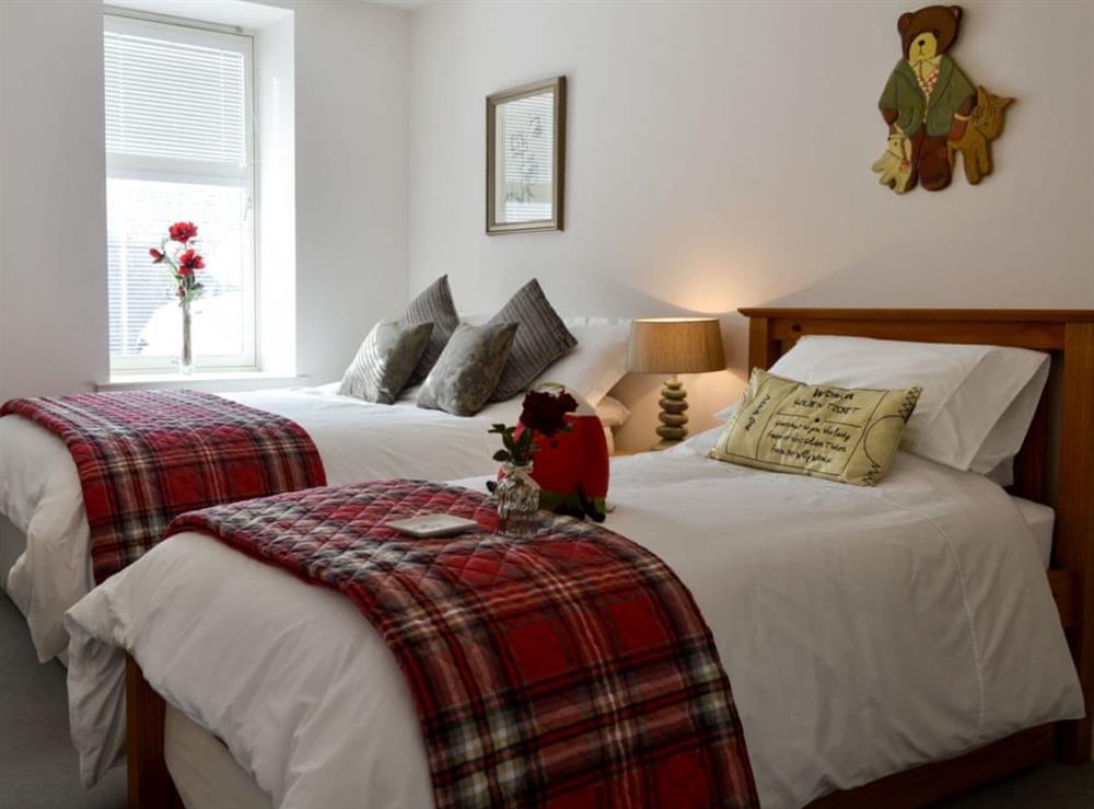 Bedroom with a double and single bed at Seascape in Inverboyndie, near Banff, Aberdeenshire