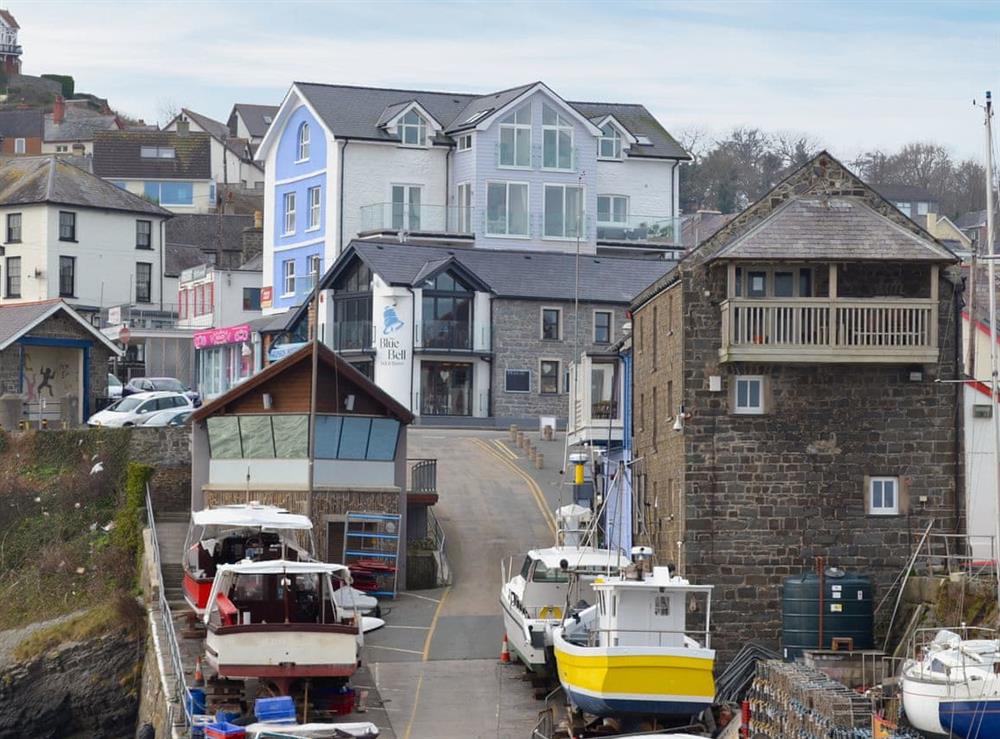 Seascape is a top floor apartment in the building with the blue side at Seascape in New Quay, Dyfed