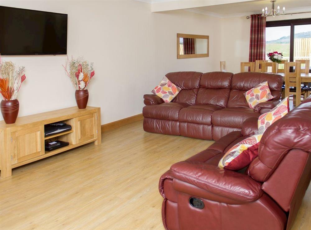 Spacious living area with open access to dining and kitchen areas at Seascape in Southerness, near Dumfries, Dumfriesshire