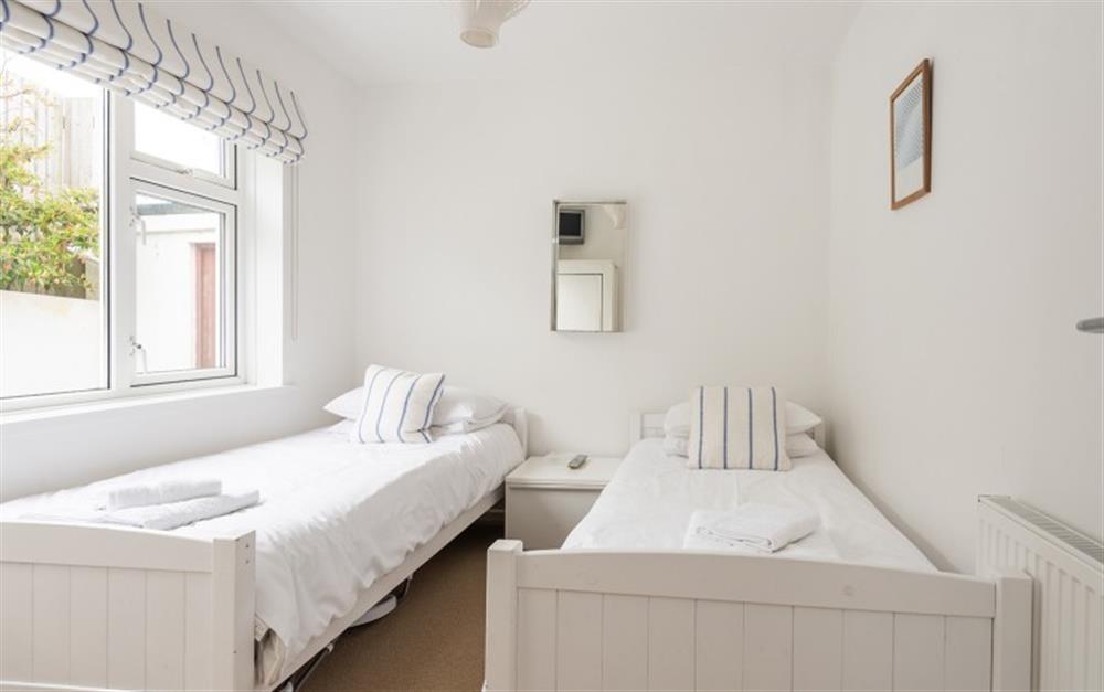 The twin bedroom  at Seascape in Thurlestone