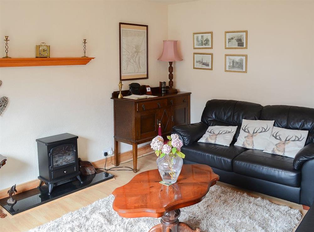 Comfortable and welcoming living room at Seashell Cottage in Fishertown, near Nairn, Morayshire