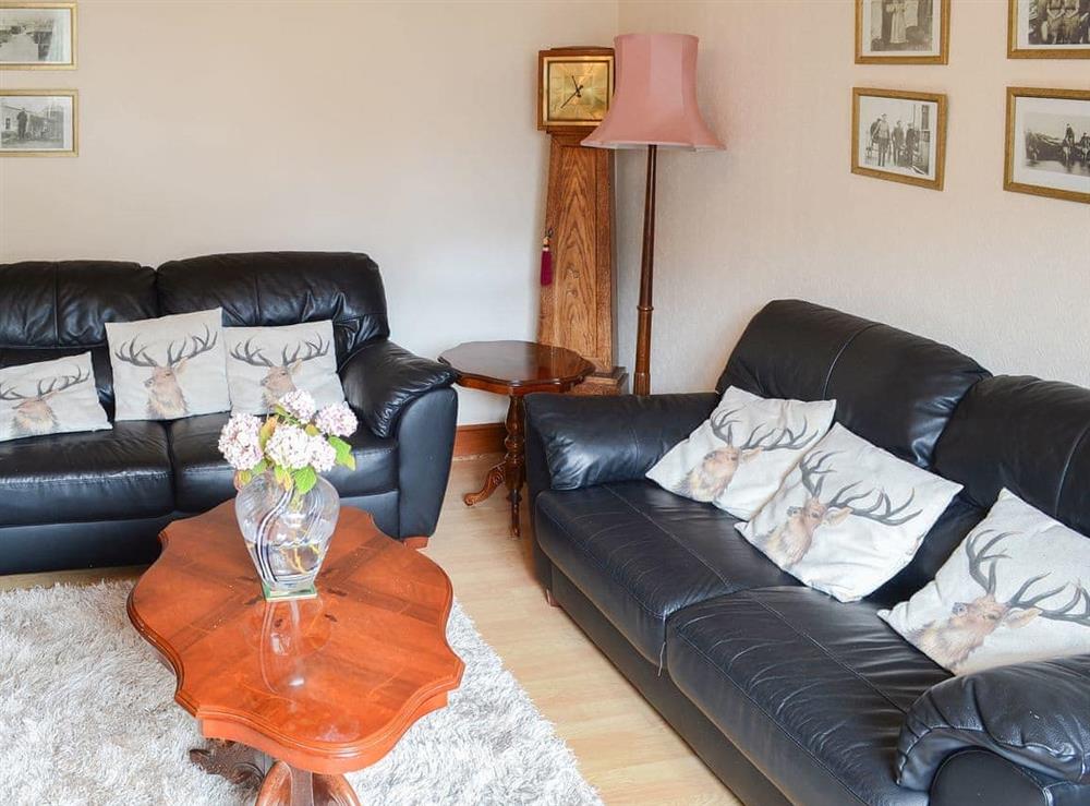 Cosy living room at Seashell Cottage in Fishertown, near Nairn, Morayshire