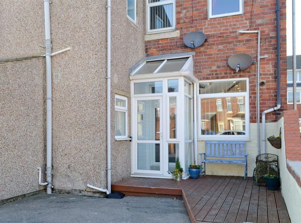 Holiday home with decked seating area at Seashells in Newbiggin-by-the-Sea, Northumberland
