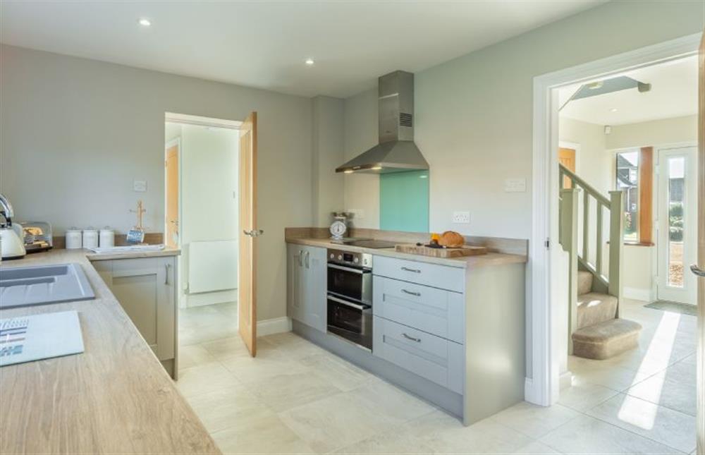 Ground floor: Kitchen with doors to entrance hall and utility area (photo 2) at Seashells, Wells-next-the-Sea